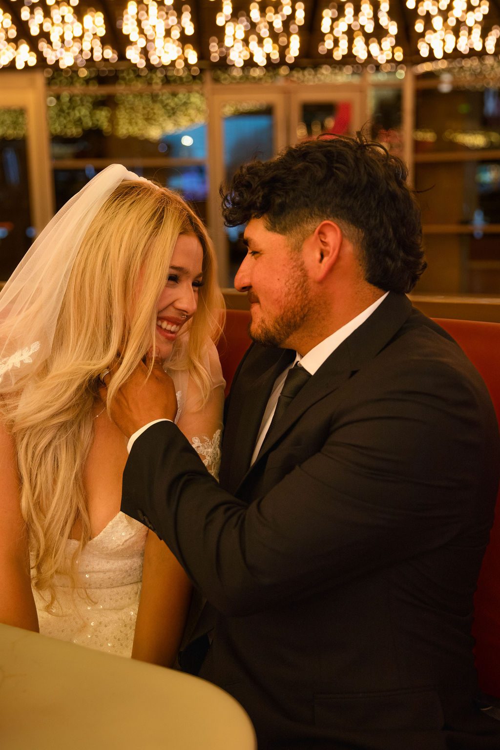Las Vegas elopement photography — couple in a diner booth after the ceremony