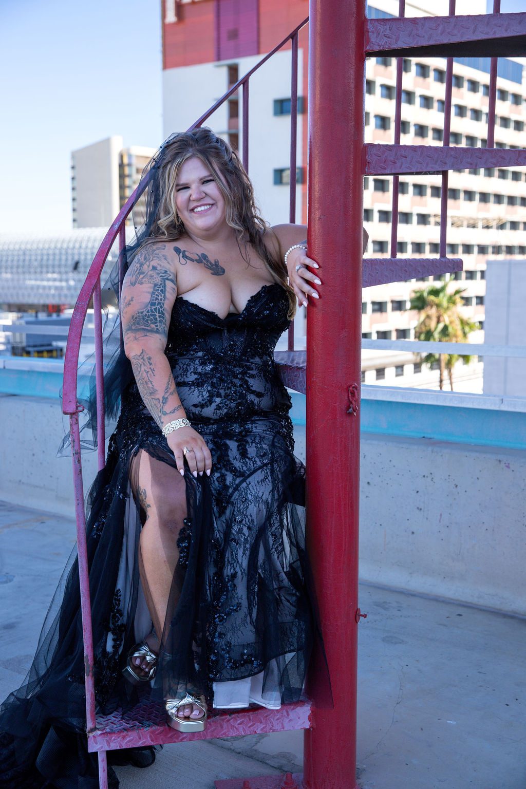 Downtown Las Vegas wedding photography — bride in a black gown on a rooftop staircase