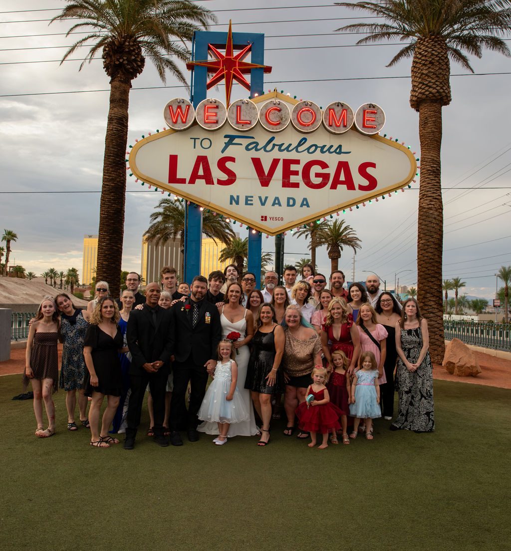 Las Vegas wedding photography — family group portrait at the Welcome to Las Vegas sign